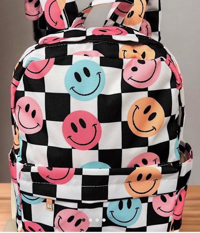 Illustrative example of backpack with smiley face