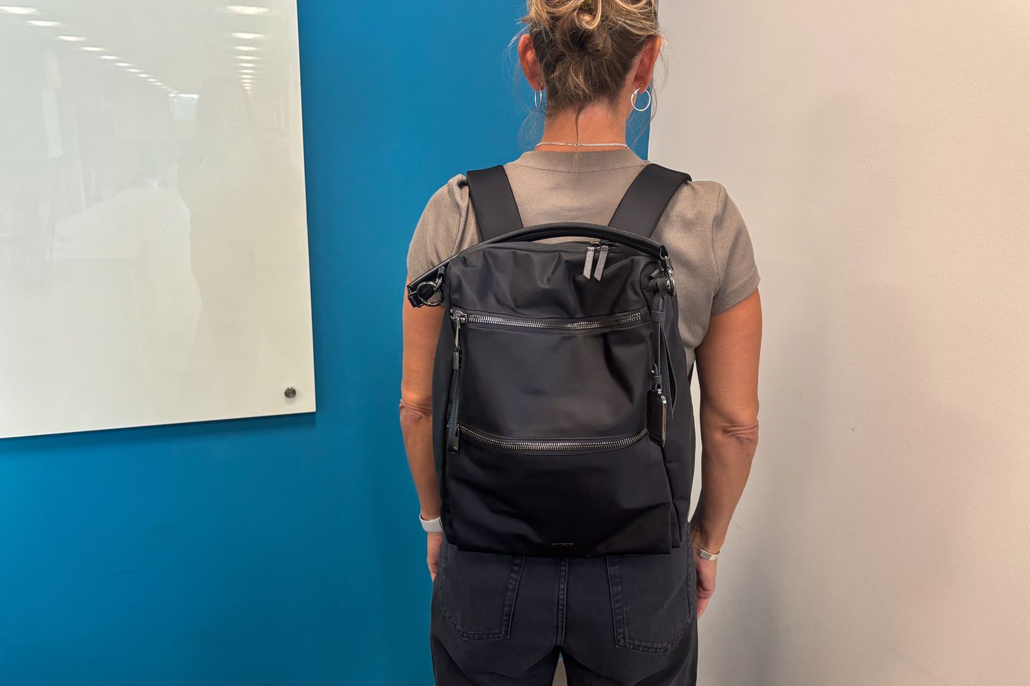 Illustrative example of convertible tote backpack