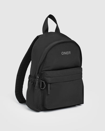 Illustrative example of miniature black backpack