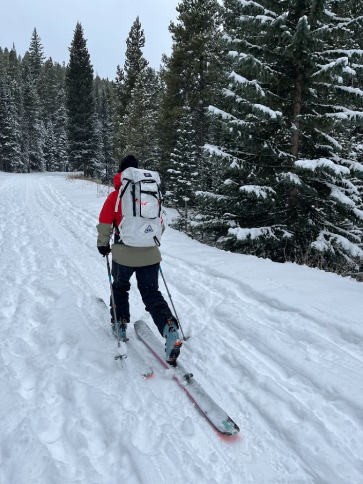 Illustrative example of skiing with backpack