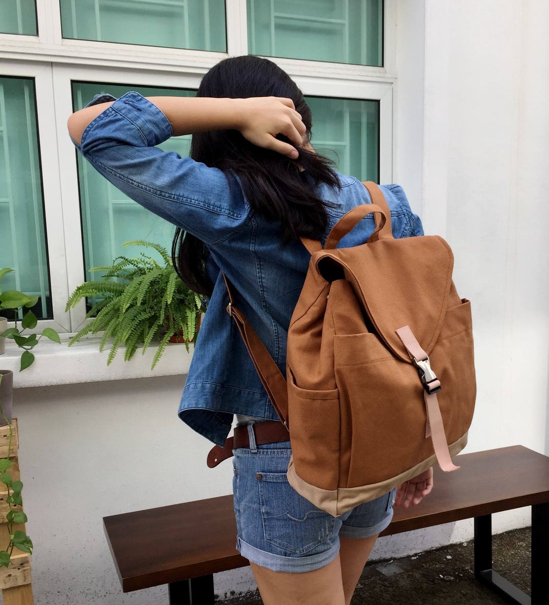 Illustrative example of tan backpack