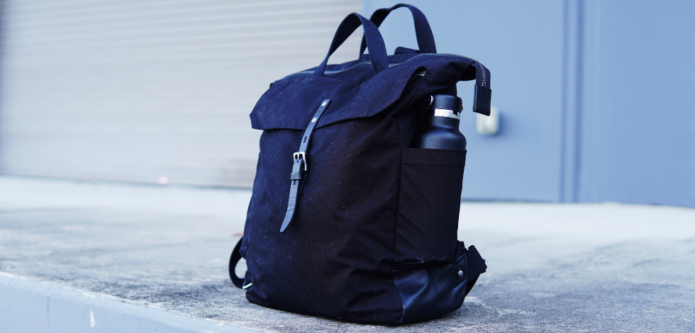 Illustrative example of waxed cotton backpack